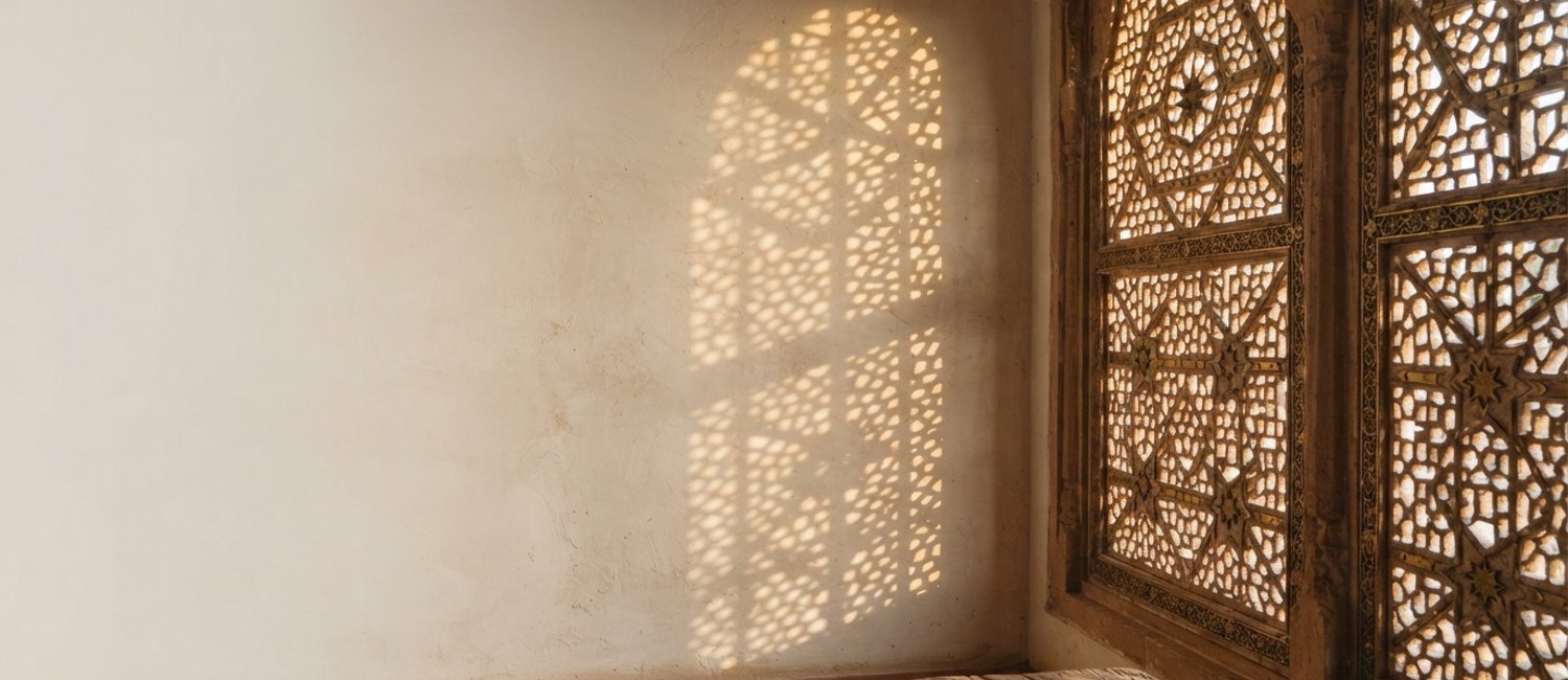 Jaali screen filtering daylight in a home designed by Aalekh in Bangalore